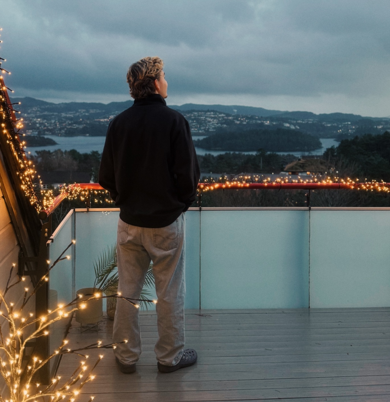 Modern vision overlooking Norwegian landscape at twilight